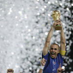 Italy’s Cannavaro lifts the World Cup Trophy after the World Cup 2006 final soccer match between Italy and France in Berlin